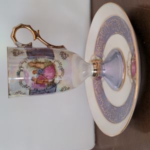 Antique demitasse 8 piece cup and saucer set.